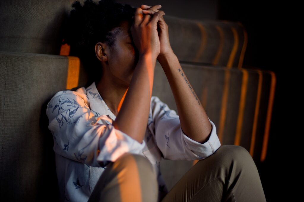 Person experiencing emotional distress before a primary care mental health screening